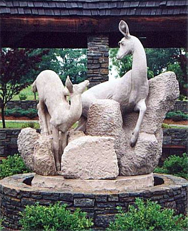 Sculpture of Doe and Fawn crossing Stream, by Meg White