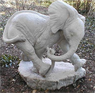 Baby Elephant with Stick, sculpture by Meg White 